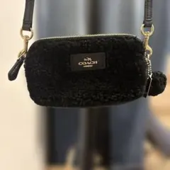 COACH ブルーポーチ ファーミニ美品 - メルカリ