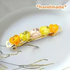 オレンジ　ハートのバレッタ②　ハンドメイド　かわいい　キラキラ　クリアカラー