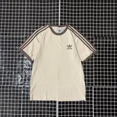 新品 アディダスオリジナルス リンガーTシャツ ブラウン ベージュ 2XL 