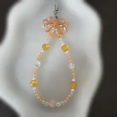 オレンジ系リボン付きビーズストラップ