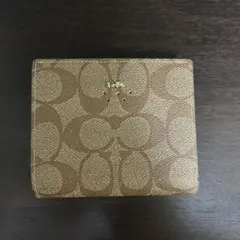 COACH ゴールド 三つ折り財布 保存袋付き