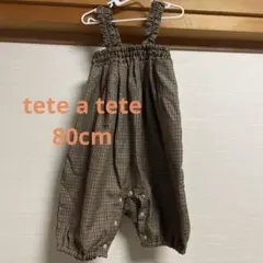 茶色と白のチェック柄ロンパース