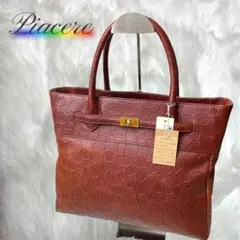 【未使用品✨】Piacere ブラウンレザー ハンドバッグ 本革 型押 キリン柄