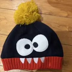 フランスDPAMボンボン付ニット帽フリース目玉