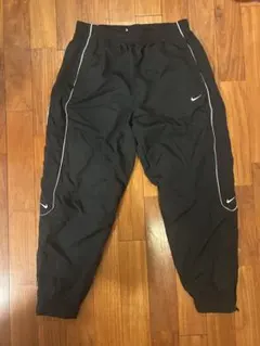 NIKE ソロスウォッシュ　ウーヴン　ナイロンパンツ　黒