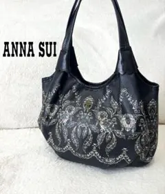 アナスイ　ANNA SUI バッグ　革　pvc 黒　花柄　蝶 モチーフ　フリルのサムネイル