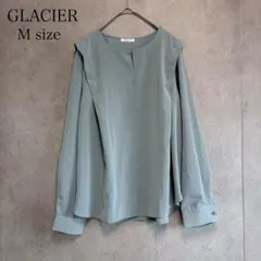 GLACIER グレイッシュブルー 肩フリルブラウス M 長袖 きれいめのサムネイル