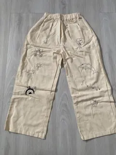 イラスト付きクリーム色パンツ 150