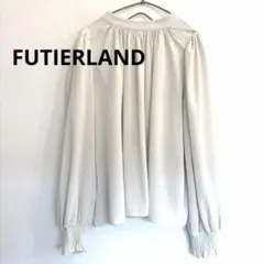 FUTIERLAND ハイネックバルーンスリーブブラウス ベージュ Ｆのサムネイル