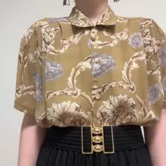 ベージュ系 王冠 ボタニカル プリント 透け感 半袖 柄シャツ 古着のサムネイル
