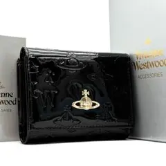 未使用保管品 ヴィヴィアンウエストウッド 三つ折り財布 オーブ がま口 総柄 黒