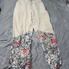SUPPLIER ニュースペーパー柄 切替パンツ