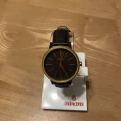 NIXON ブラック ゴールド アナログ腕時計のサムネイル