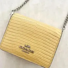 コーチ 小銭入れ ミニ財布 ウォレット ミニバッグ レディース 黄 エンボス 春