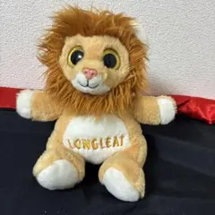 画像は、ロングリート（Longleat）と刺繍されたライオンのぬいぐるみです。