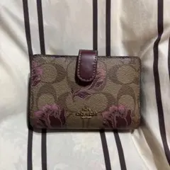 Coach 花柄二つ折り財布