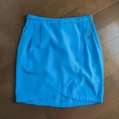 H&M とてもキレイな水色の ラップスタイルミニスカート サイドポケット付き