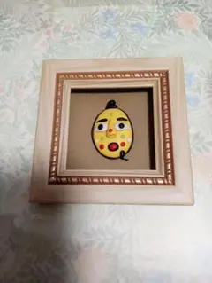 カラフルな顔のアート フレーム付き