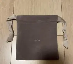 ete 巾着ポーチ　未使用品のサムネイル