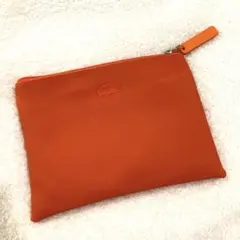 ラコステ ポーチ オレンジ