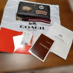 COACH パッチ付き長財布 ダークブラウン