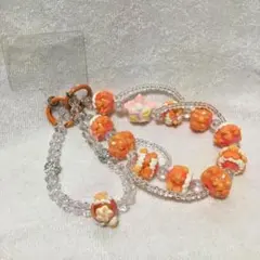 携帯ストラップオレンジ花モチーフストラップ