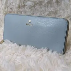 美品 FURLA フルラ カメリア ラウンドファスナー 長財布 ライトブルーのサムネイル