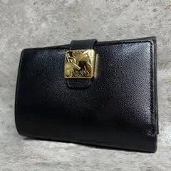 ✨良品✨ サンローラン 二つ折り財布 YSロゴ ゴールド金具 黒色のサムネイル