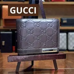GUCCI グッチ 二つ折り財布 シマ インターロッキング GG ロゴプレート