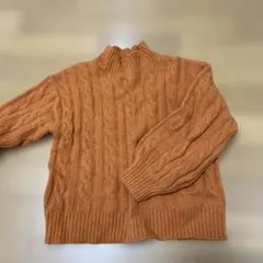 オレンジ色 ケーブル編みセーター 130