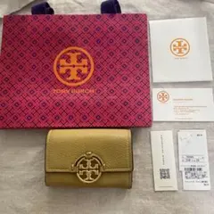 Tory Burch 二つ折り財布 イエロー　紙袋付⭐︎のサムネイル