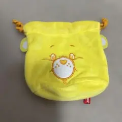 イエロー ケアベア　ふわふわフェイス巾着　ガチャガチャ