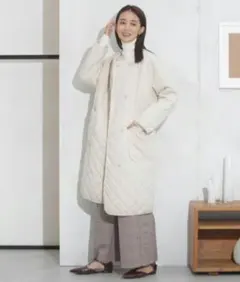 ナノユニバース ノーカラーキルティングロングコート 撥水加工　ライトベージュ　F