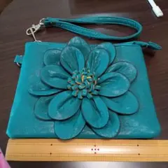 ターコイズ 花モチーフ クラッチバッグ
