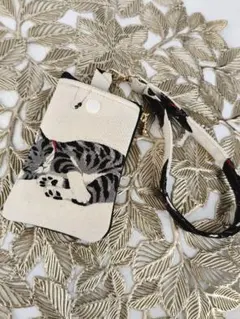 お眠りにゃんこのミニポーチ ハンドメイド ポーチ　小銭入れ　猫　メイクポーチ