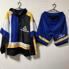 ルコックスポルティフ マルチカラーナイロンジャージセットアップ レイヤード L