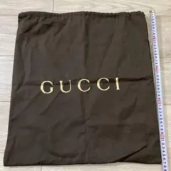 グッチ　ロゴ入り　ブラウン　収納袋