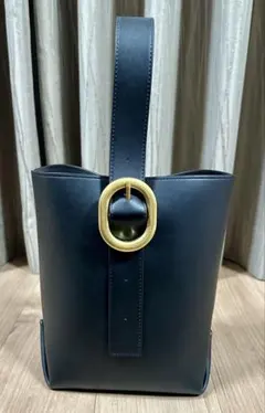 Mila Owen バケットバッグ ブラック　黒 ゴールドバックル　レザー調