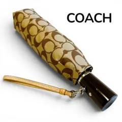 【美品✨COACH/コーチ】シグネチャー柄　折り畳み傘　アンブレラ ワンタッチ式のサムネイル
