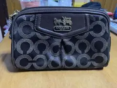 COACH ブラウンドットパターンポーチ