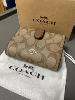 最安値　コーチ　二つ折り財布