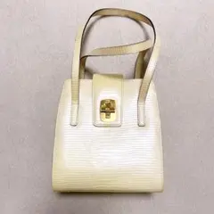 WAKO ミニショルダーバッグ レザー ターンロック イエロー　黄色