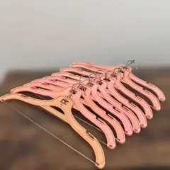 昭和レトロなピンクのプラスチック衣類ハンガー9本セット