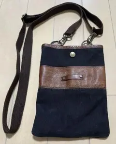 TETE HOMME ビンテージ風レザーショルダーバッグ