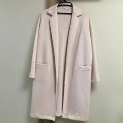 春物淡いピンクのコート