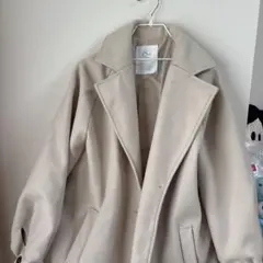 クリーム色 ロングコートのサムネイル