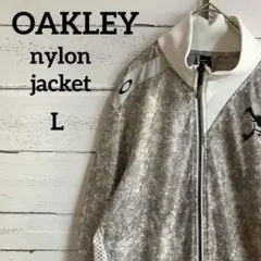 【OAKLEY】オークリーskull transarentジャケットプリントロゴ