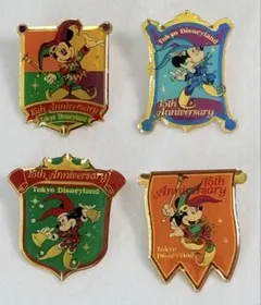 ③TDL15周年ピンバッジ