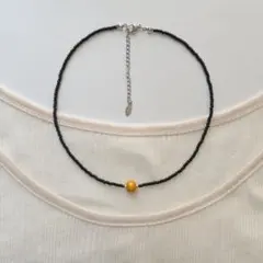 オレンジ　ウッドビーズ　ブラック　黒　アジャスター　チョーカー　ゴールド