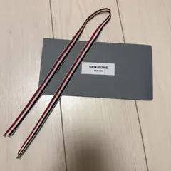 THOM BROWNEトムブラウン レザー 手袋 黒 ストラップ付き - メルカリ